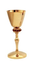 Calice doré nœud orné de pierres rouges